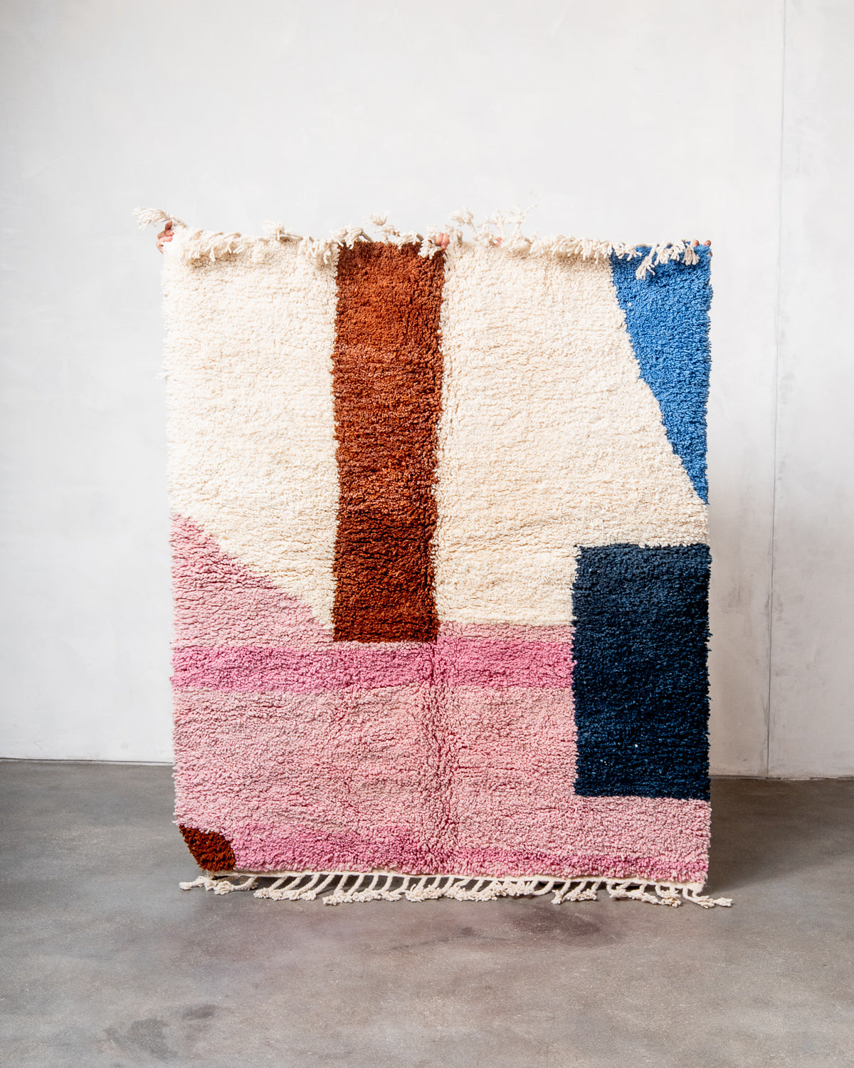 Modern, designer, handcrafted Berber rug from Morocco. Beniourain carpet with beautiful colours and patterns and fluffy wool texture.